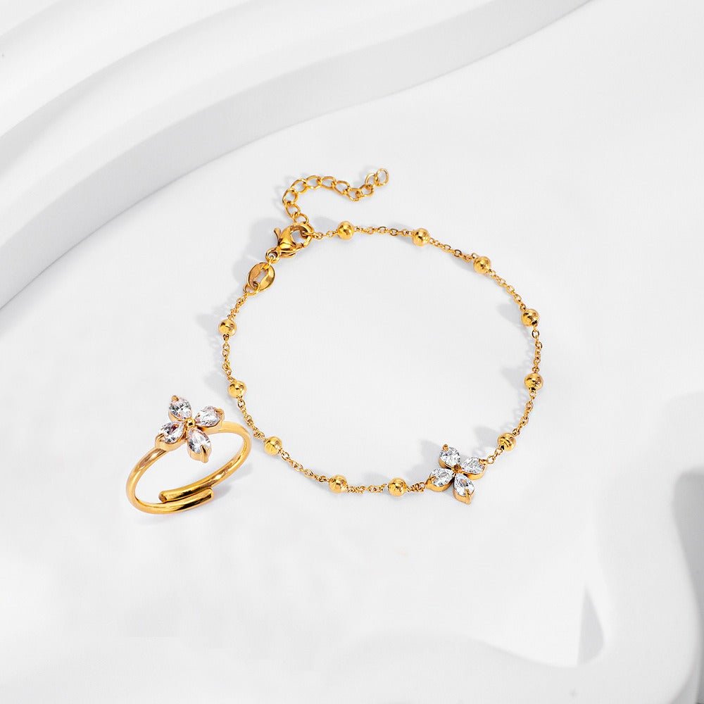 18K gold four - leaf flower inlaid with gemstones, exquisite and dazzling necklace, bracelet, earrings and ring set - mavazie