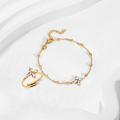 18K gold four - leaf flower inlaid with gemstones, exquisite and dazzling necklace, bracelet, earrings and ring set - mavazie