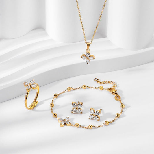 18K gold four - leaf flower inlaid with gemstones, exquisite and dazzling necklace, bracelet, earrings and ring set - mavazie